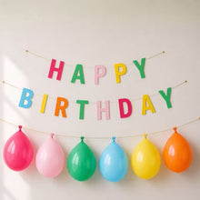 Happy birthday balloon banner with pink, green, blue, yellow, orange latex balloons