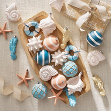 Member's Mark coastal shatterproof ornament collection with shells, seahorses, starfish and striped balls