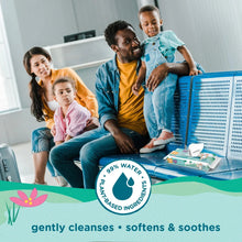 Fragrance-free baby wipes pack held during family time with children on a couch