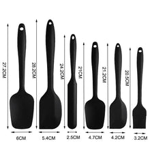 Set of black silicone spatulas with hanging holes and length measurements