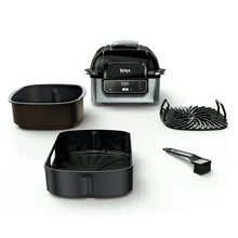 Electric indoor grill with lid plus black air-fry basket, grill plate, and spatula
