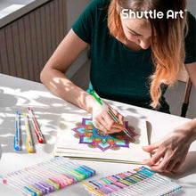 People using multicolor glitter gel pens on a patterned coloring page