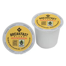 Two white single-serve coffee cups with Breakfast Blend light roast labels
