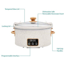 Speckled slow cooker with clear glass lid and wood-style handles, linen body