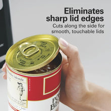 Hand holding a can lid after opening with smooth-touch edge
