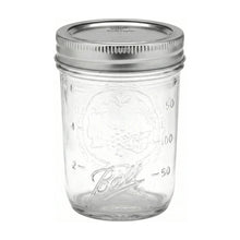Regular-mouth clear mason jar with metal lid, etched measurement markings
