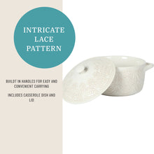Stoneware casserole dish with intricate lace pattern, built-in handles and lid