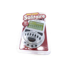 Handheld solitaire card game in clear blister with red backing, green LCD screen