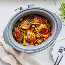 GreenPan slow cooker insert filled with roasted chicken and vegetables.