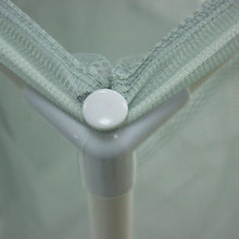 Mesh bin corner with plastic connector cap on the frame of a laundry sorter cart