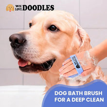Blue dog bath brush with bristle tips lathering a golden dog during shower washing