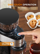 One-touch electric coffee grinder with hand pressing the control and dial