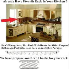 Hanging utensil rack with hooks and wire utensil holder, ready for storage