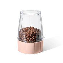 Rose personal blender jar filled with coffee beans, clear container on blender base