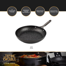 12 in black non-stick fry pan with speckled interior and long handle