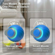 Blue interactive cat toy ball showing green status ring on power button