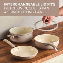 Taupe ceramic cookware set with three pots and matching interchangeable lids
