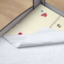White fleece multi-use pad with quilted surface and folded corner