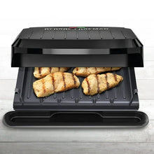 George Foreman grill with sausage on ribbed cooking plates, lid open