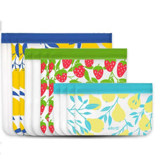 Stacked reusable plastic storage bags with strawberry, lemon, and blue leaf prints
