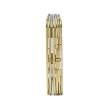 Gold metal folding picture frame edge view with stacked hinged sections