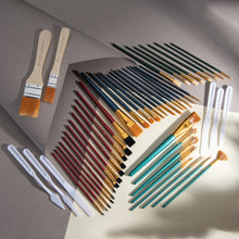 Assorted paintbrush set with long handles and mixed bristle tips, laid out