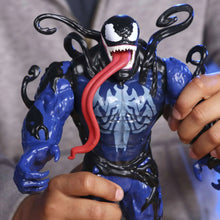 Venom-style action figure with open mouth, red tongue, and flowing black tendrils