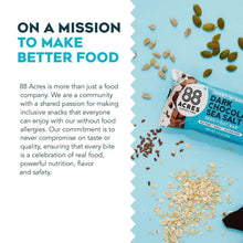 88 Acres dark chocolate sea salt granola bar with scattered seeds and crumbs.