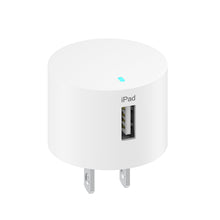 White USB-A wall charger with single charging port and small top indicator light.
