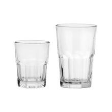 Clear glass tumblers, two sizes, cylindrical sides and thick bases