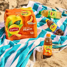 Lipton iced tea bottles and tea bags with iced tea Peach drink cartons