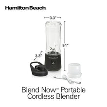 Portable cordless blender with clear jar, black base, and travel lid with charger cable