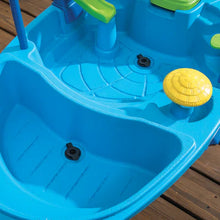 Blue water table basin with molded channels, drain holes, and yellow lid