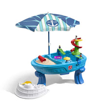 Kids water table with blue anchor umbrella and colorful water-play parts