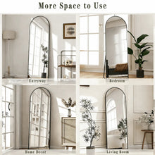 Arched full-length black-framed mirror shown in multiple room settings with window light reflections.