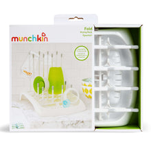 Packaged white bottle drying rack with peg grid and accessories shown