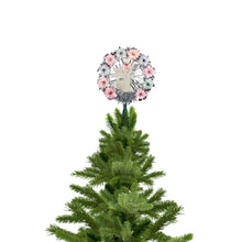 Angel tree topper with lighted tinsel wreath on a green Christmas tree