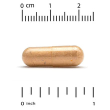 Milk Thistle Plus turmeric extract veggie capsule with size ruler for scale.