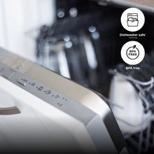 Stainless blender base with control icons indicating dishwasher-safe and BPA-free parts