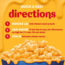 Macaroni and cheese serving with thick orange cheese sauce
