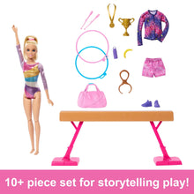 Gymnastics playset with blonde doll, balance beam, and colorful accessory parts