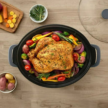Mussel gray slow cooker with chicken and vegetables visible in the pot