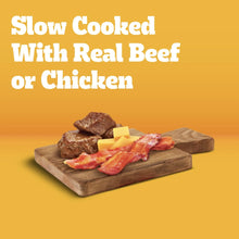 Dog food label reading slow cooked with real beef or chicken, with meat pieces on board