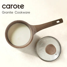 Brown speckled nonstick skillet with wood handle and matching glass lid