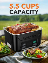Black heated lunch box with 5.5-cup capacity, holding a covered hot meal inside