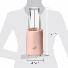 Rose personal blender on stand, clear jar installed, compact counter size shown
