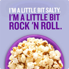 Bowl of kettle corn with coarse salt topping on a purple plate