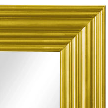 Gold mirror frame corner detail with beveled edge and glass reflection