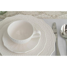 White porcelain bread & butter plate with embossed scalloped rim and cup