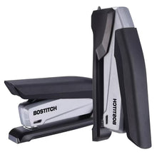 Bostitch manual desktop stapler shown from side, black base and gray top.